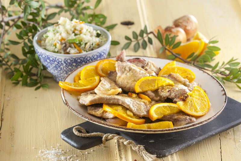 Secretos de porco preto com laranja