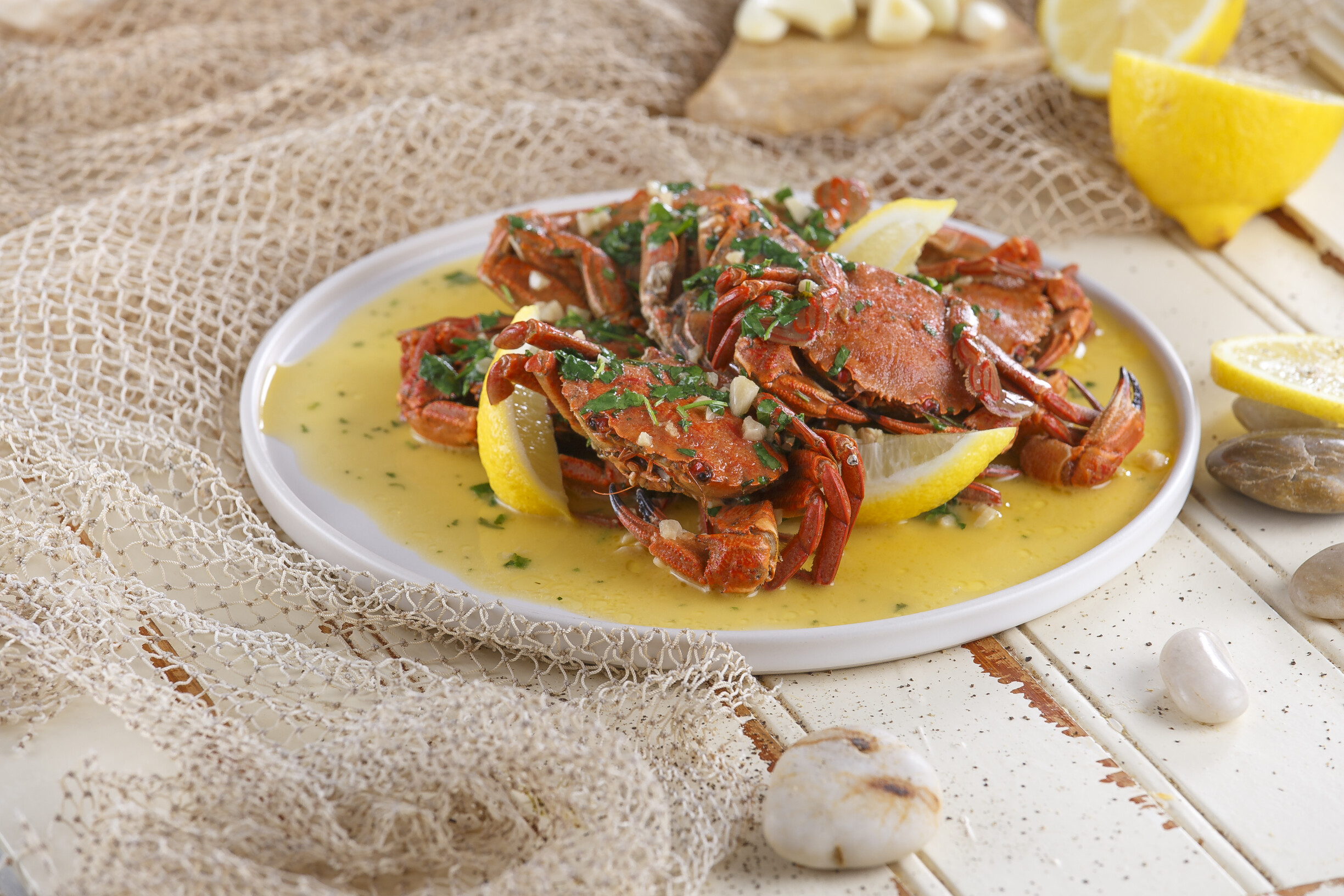 Navalheiras com molho de ervas