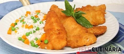 Filetes de pescada com arroz colorido