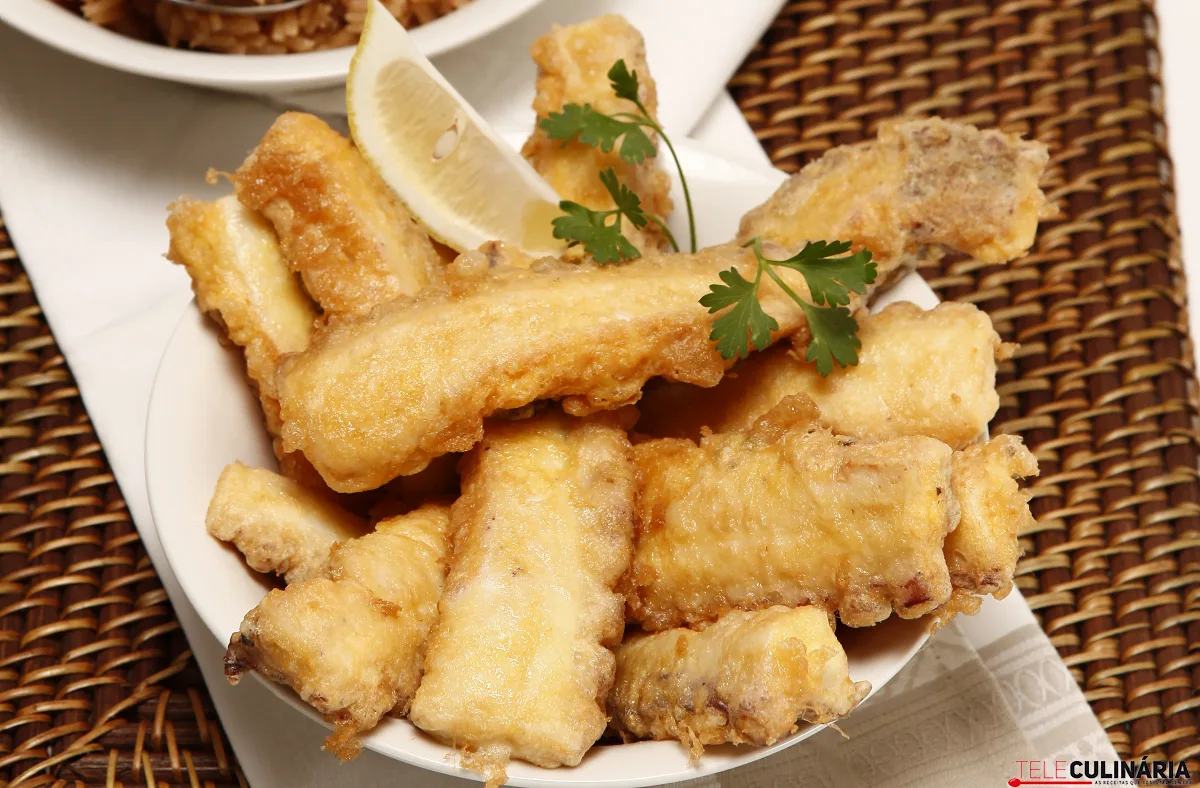 Arroz de polvo no forno com filetes do mesmo