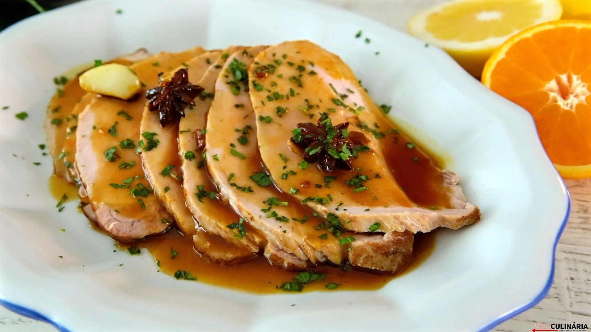 Lombo com molho de mel e citrinos