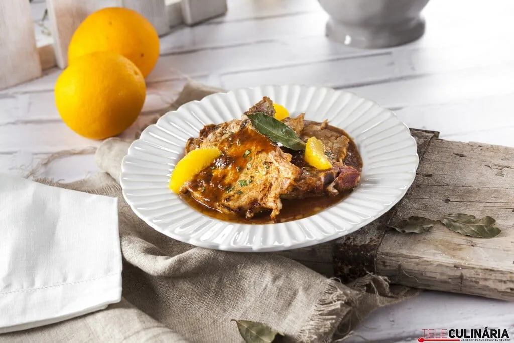 Costeletas com molho de laranja