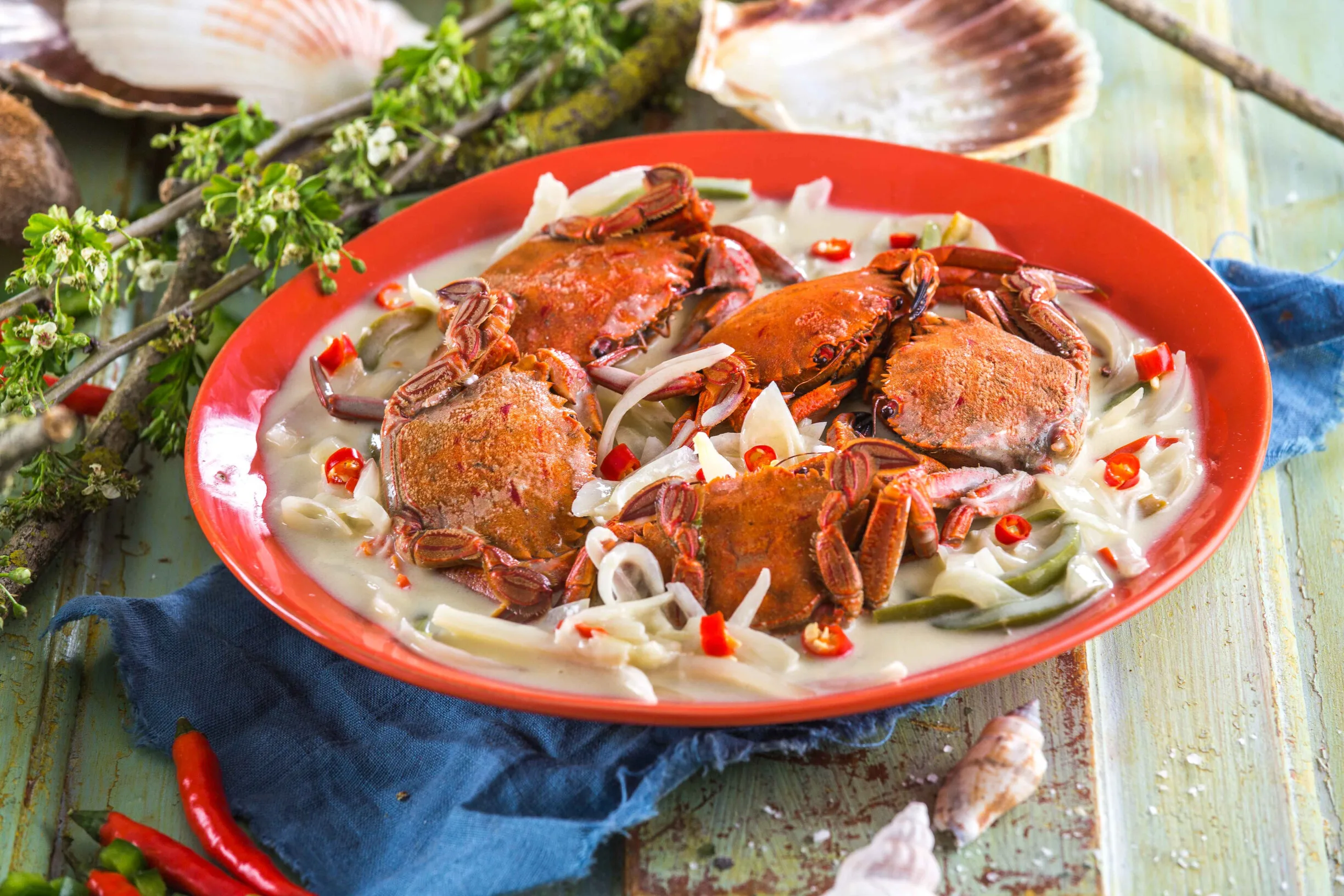 Caranguejos com molho de coco