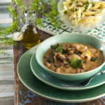 Lulas estufadas com cerveja e ervas frescas